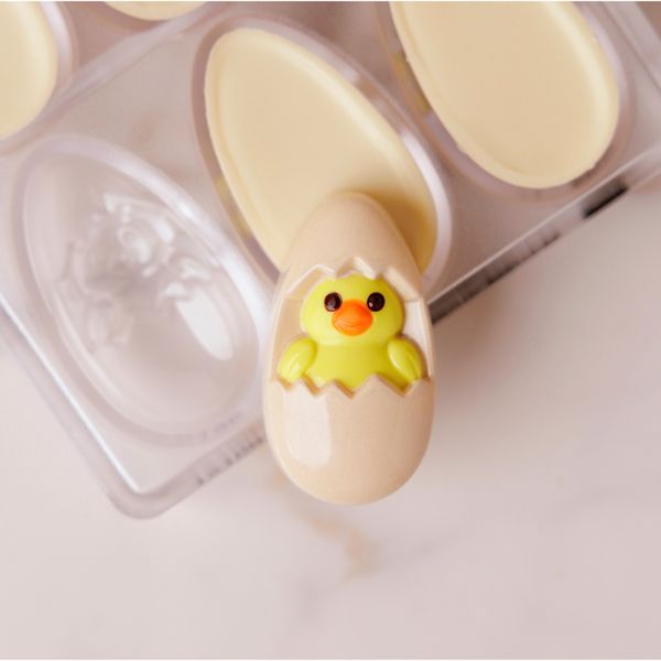 12190 CW Модуль для шоколада "Курча в яйці" 59х34х20 мм, 3х4,28 г